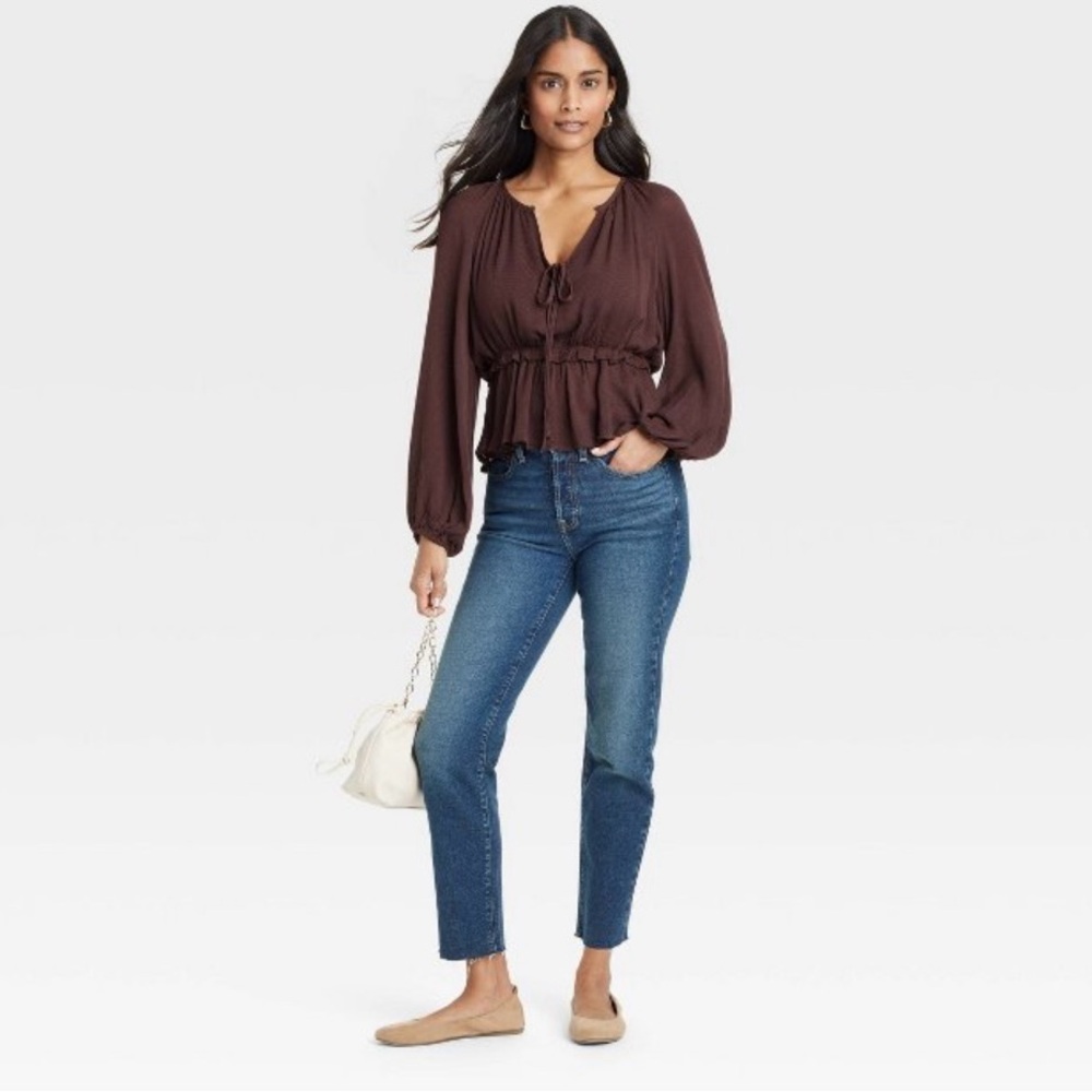 Long sleeved tie front peplum blouse